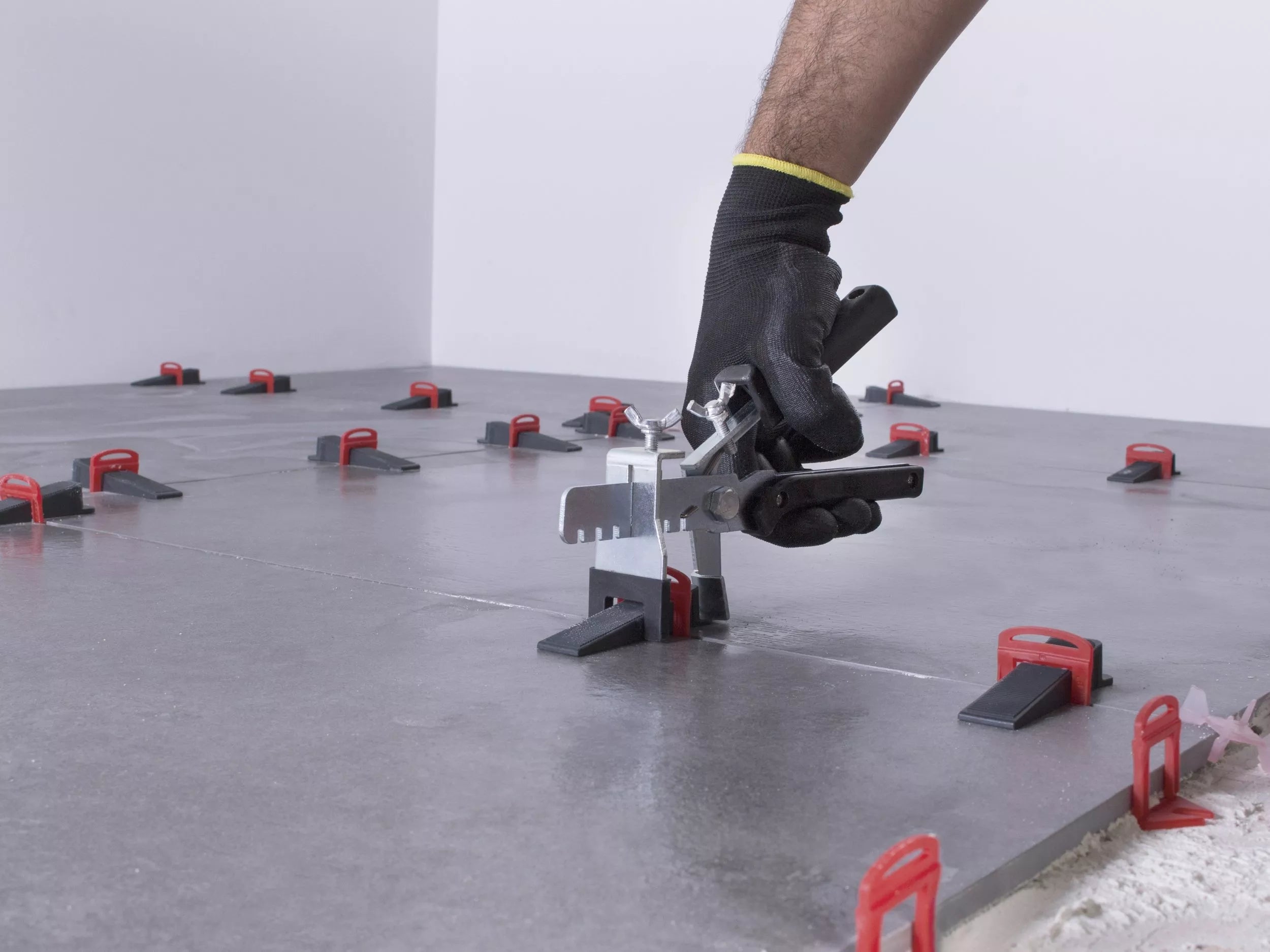 Rubi delta leveling system installation at Falco + Petra Surfaces in Long Beach, CA