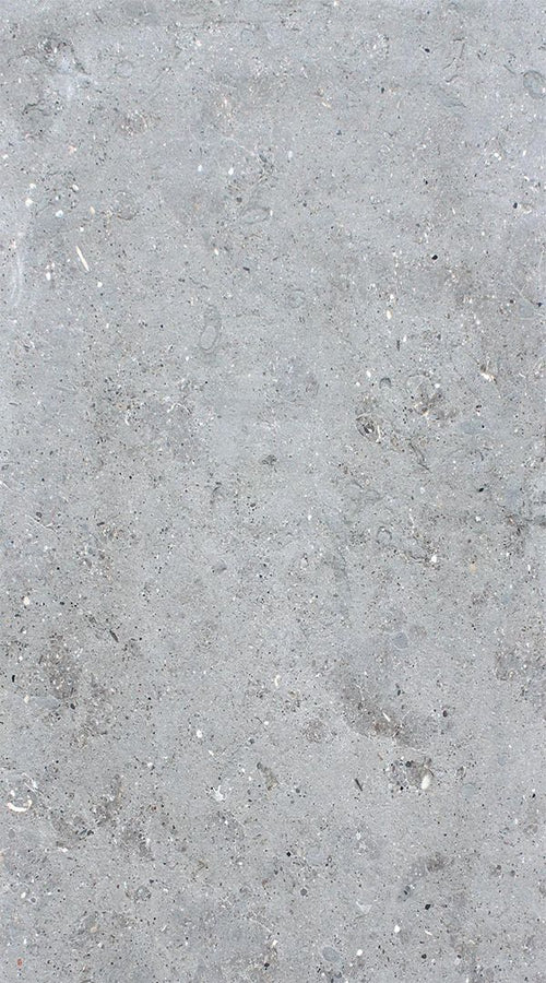 Premium limestone display at Falco + Petra Surfaces showroom in Long Beach, CA