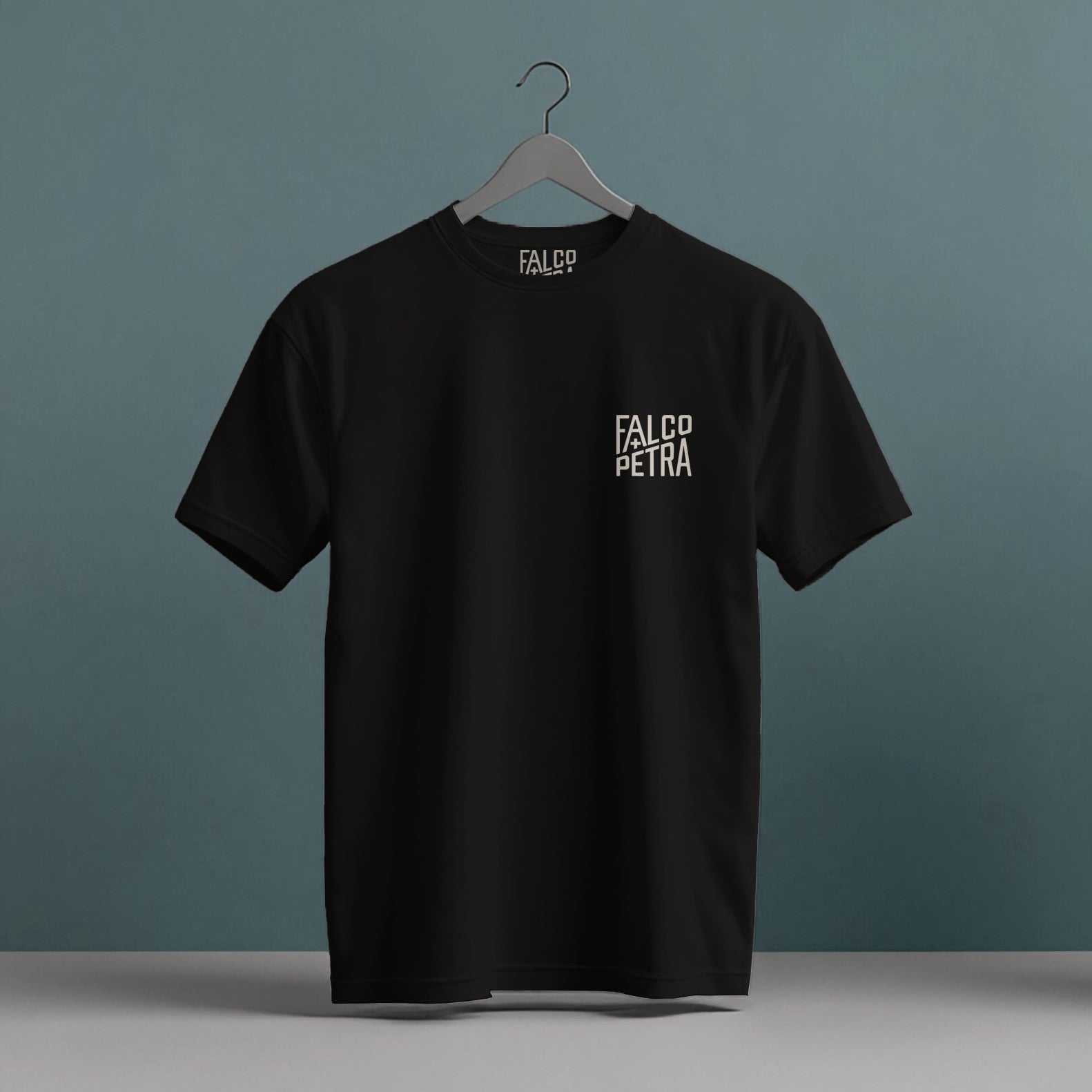 black t shirt with falco petra text