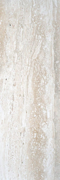 Premium travertine stone display at Falco + Petra Surfaces showroom in Long Beach, CA