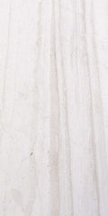 Premium porcelain tile display at Falco + Petra Surfaces showroom in Long Beach, CA