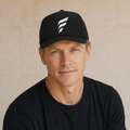 Man wearing the black Falco + Petra Torch performance snapback